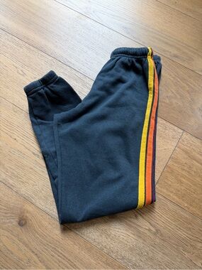 Aviator Nation Black Jogger Pants with Yellow and Orange Side Stripe